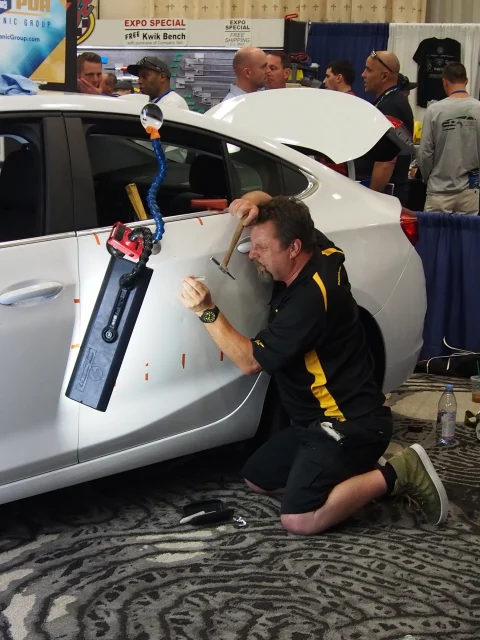 Dent Devils working on dent 480x640